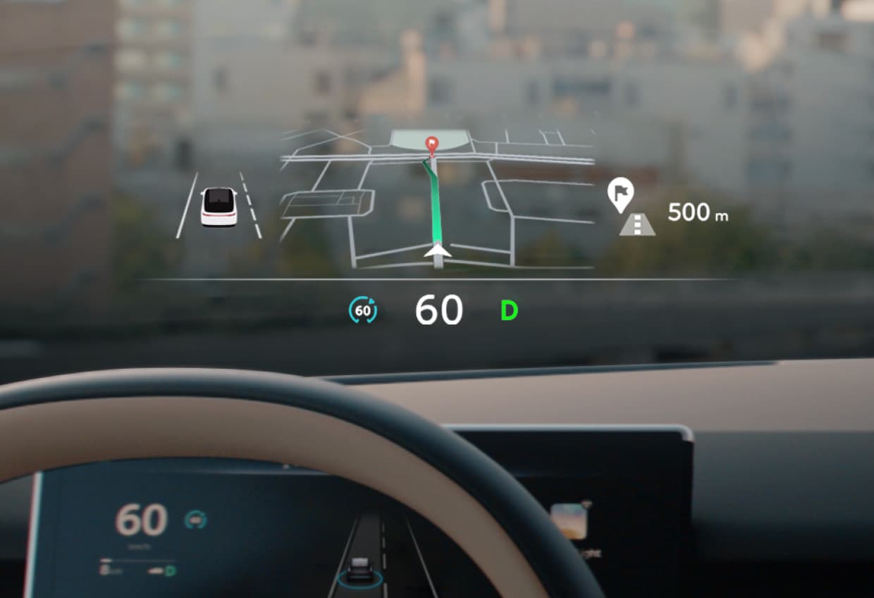 Den forbedrede 16,3" HUD (Head Up Display) Den forbedrede 16,3" HUD (Head Up Display)